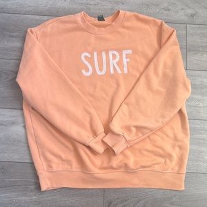 Orange made of cotten worn not often no stains soft